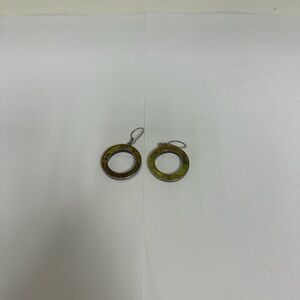Metallic green and yellow circle earrings with silver lining.